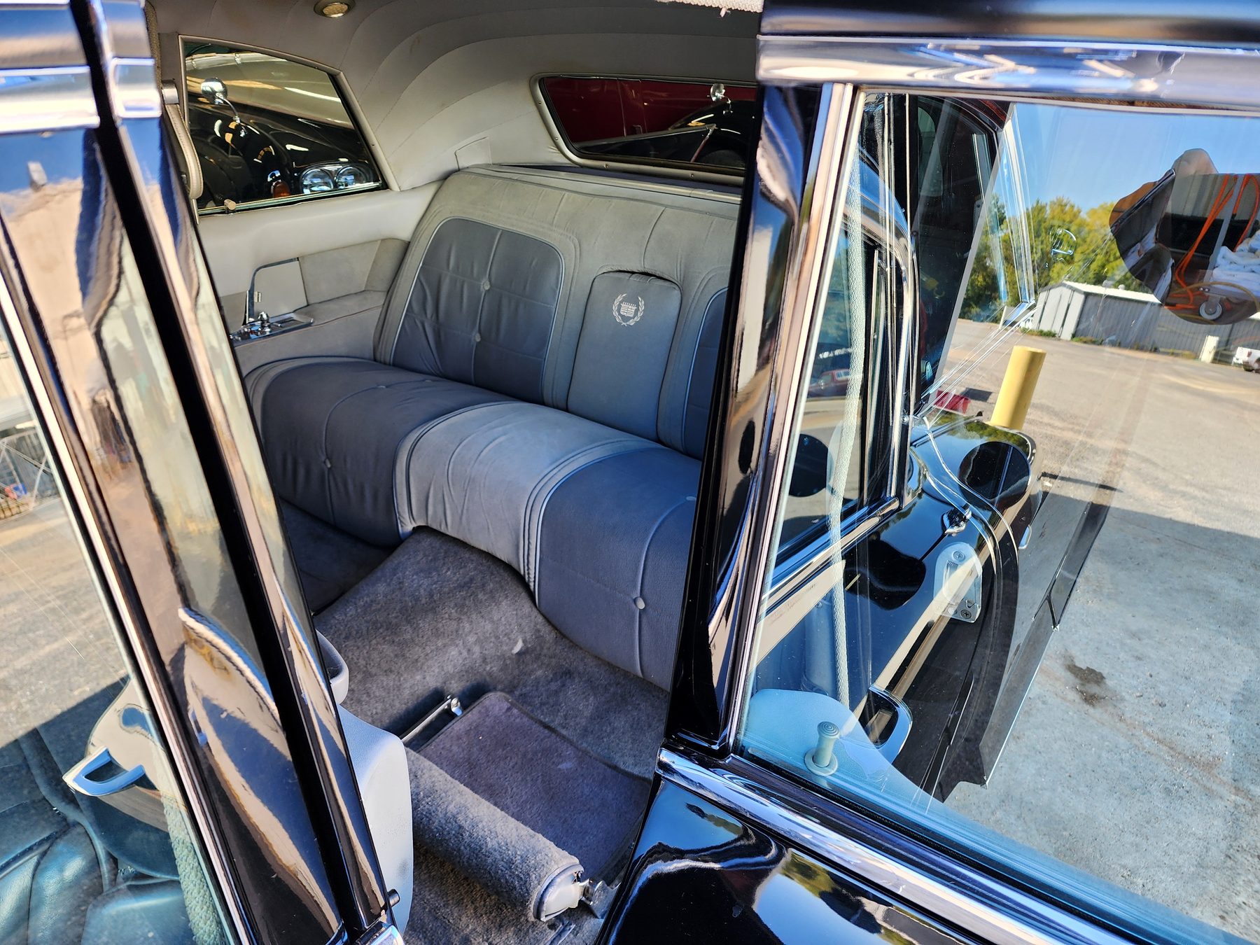 The rear bench with the Cadillac crest