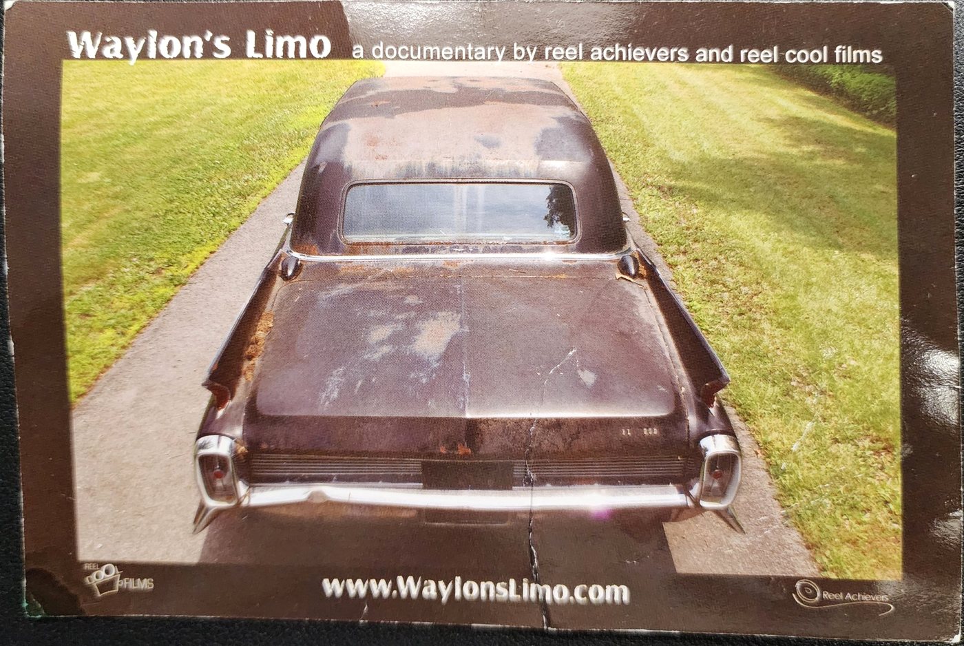 Postcard showing the limousine before restoration, rear view